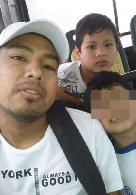 Nicolás Nahuel Reales (9) junto a su padre y hermano de 6 años.